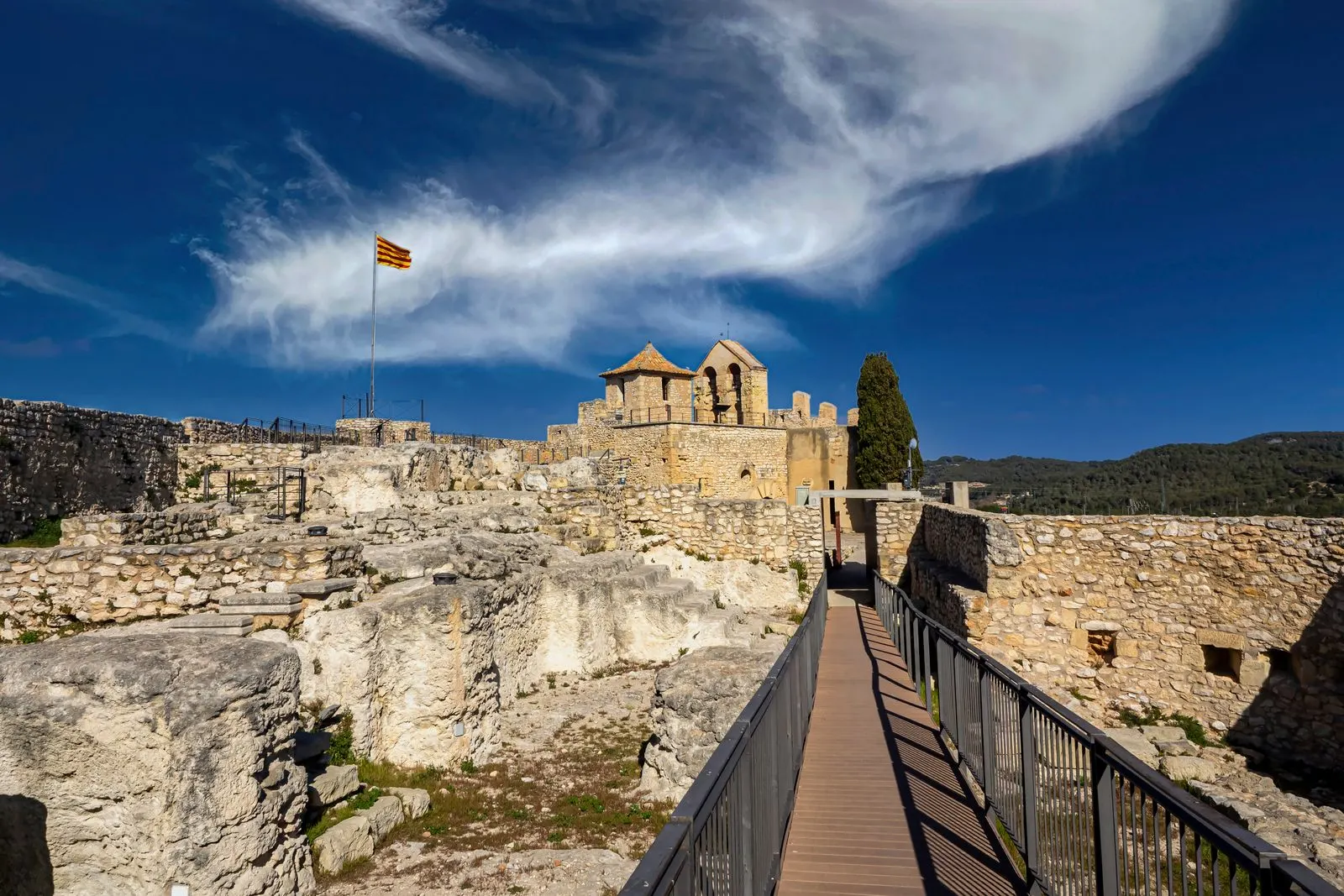 Medieval castle ruins under a dramatic sky