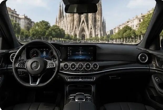 Dashboard of the Executive Class taxi with the Sagrada Familia through the windscreen