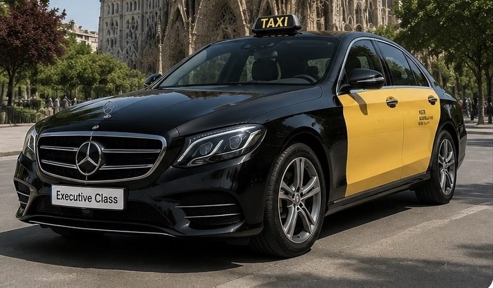 Black and yellow Mercedes Executive Class taxi in front of the Sagrada Familia in Barcelona